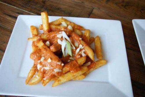 Butter Chicken Poutine - Bombay Grill Milton
